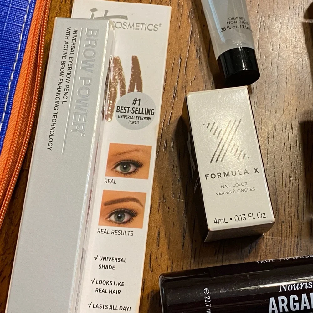Ipsy makeup bags (3) with 14 different products. New, never opened.
